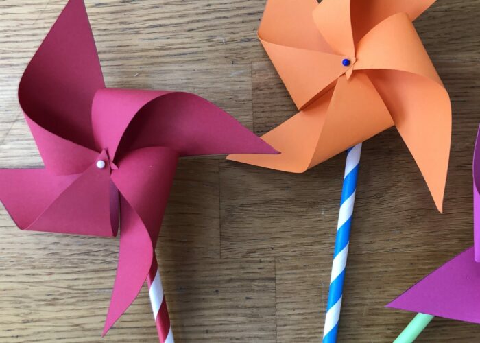 Pinwheels made from paper straws, card and a pin