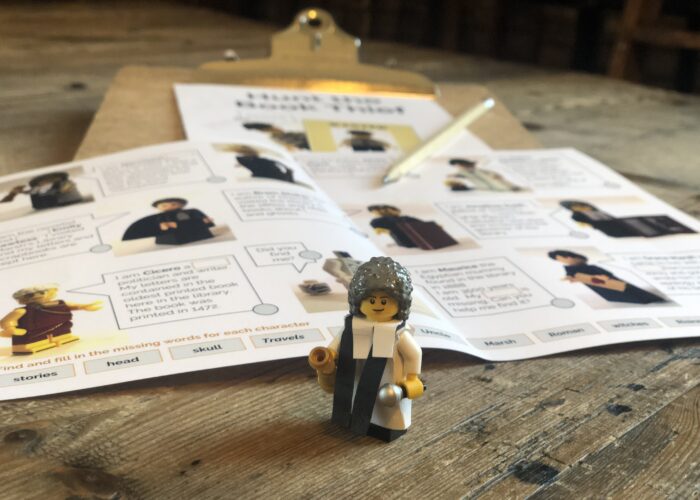Marsh minifigure in front of a hunt sheet