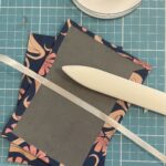 Fold out book with paper cover