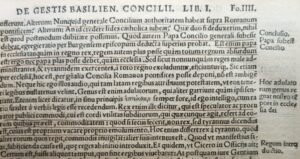 Detail of a page of a 16th century book, showing printed text with underlining in ink